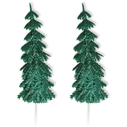 Two large green evergreen tree cake picks with layered pine branch texture and white pick stems, shown on a white background.