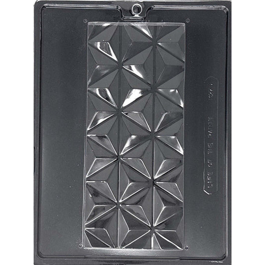 Clear Extra Large Dubai Chocolate Bar Mold photographed against a black background, featuring one long rectangular 1-pound bar cavity with a bold faceted geometric pattern.