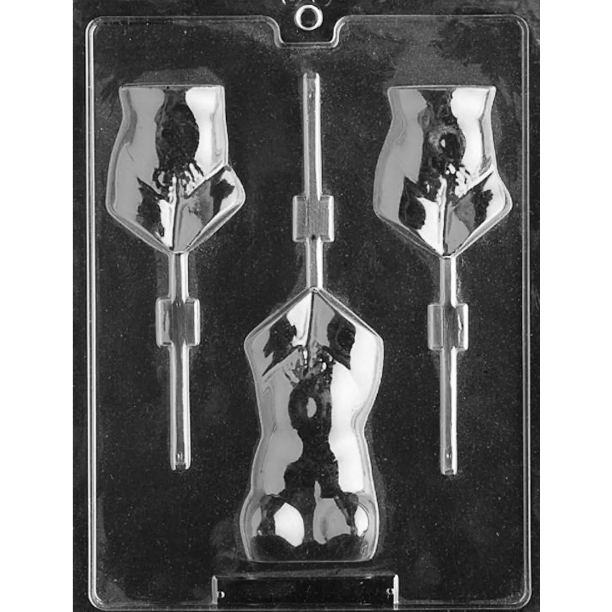 Clear plastic chocolate lollipop mold photographed against a black background with three female torso cavities featuring curvy figures, lingerie details, and lollipop stick channels.