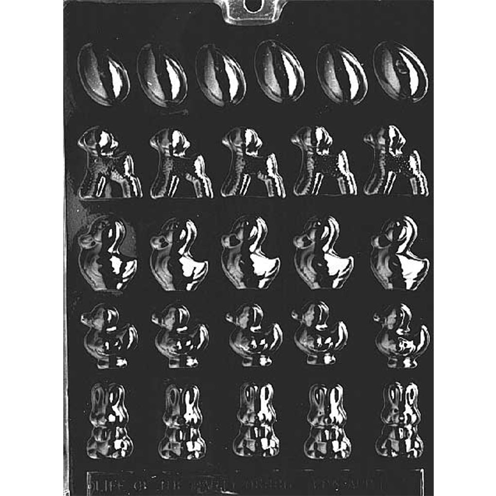 Clear plastic five-piece Easter assortment chocolate mold shown on a black background, with rows of small cavities shaped like an egg, lamb, duckling, chick, and bunny.
