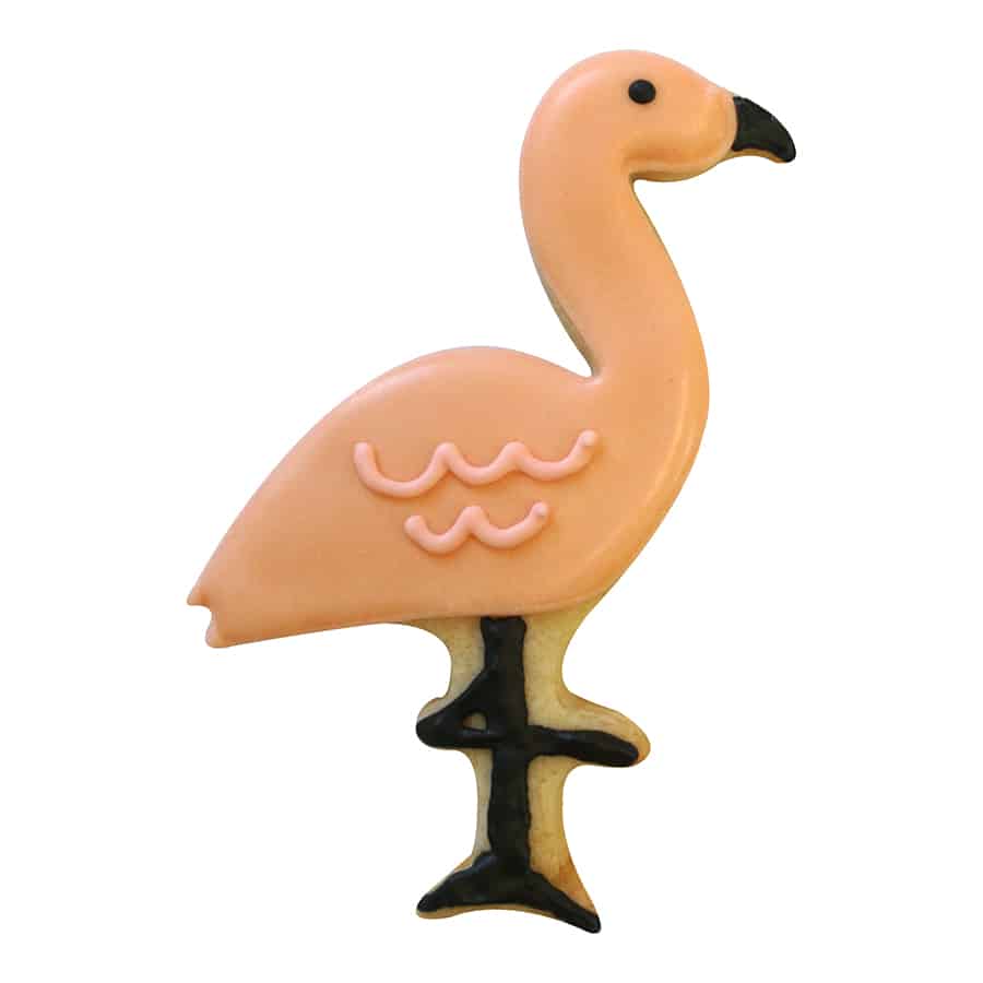 Light pink flamingo cookie with black icing legs and beak, featuring a wavy icing design on its wing.