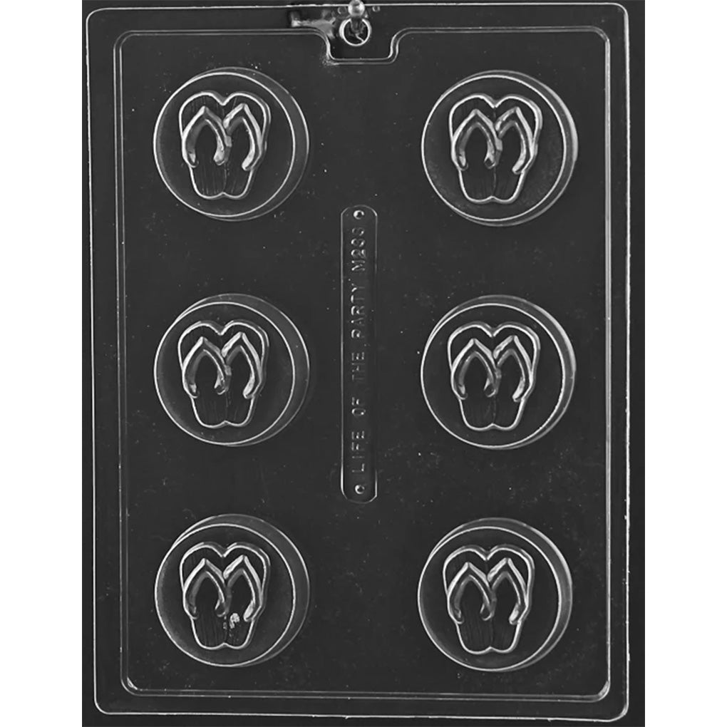 Clear plastic chocolate mold with six round cavities, each featuring a raised flip-flop sandal design centered inside a circular border.
