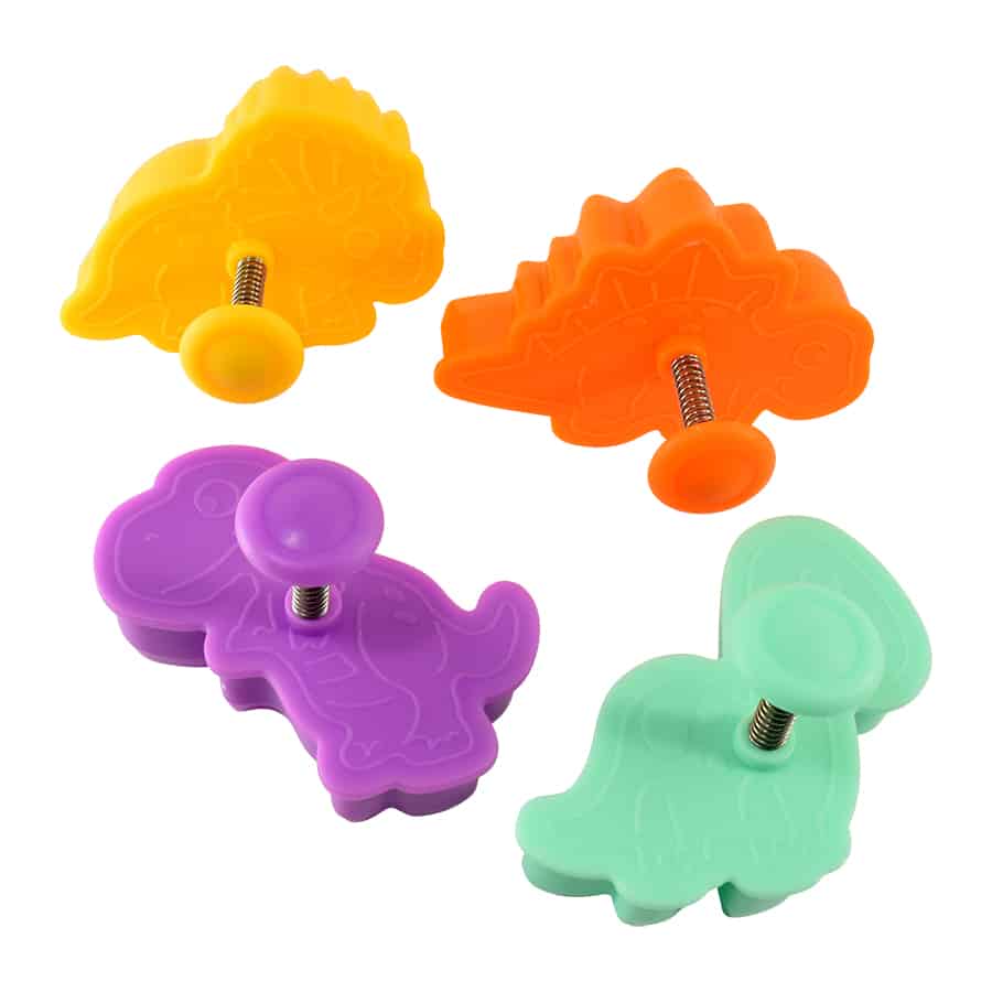 Side view of dinosaur cookie stampers with spring-loaded handles for imprinting dough.