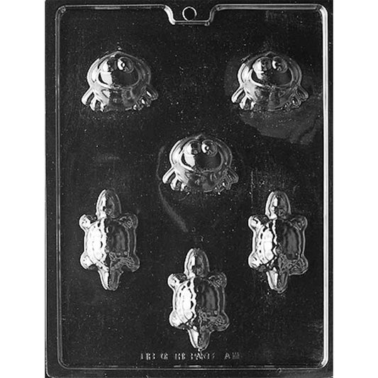 Clear plastic frogs and turtles chocolate mold with six deep cavities: three 2-inch frogs and three 2 3/4-inch turtles with detailed faces and shells.