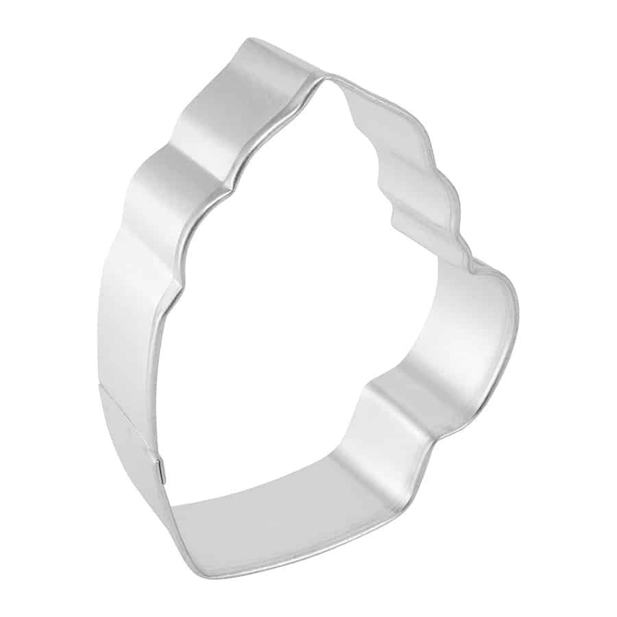 Angled side view of the mug-shaped cookie cutter, showing its depth and clean edges.