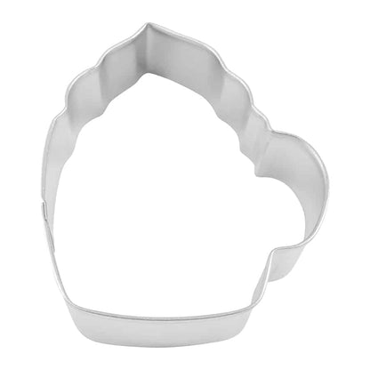 Top-down view of a frothy mug cookie cutter with a rounded handle and wavy top edge.