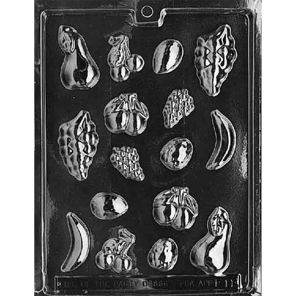 Clear plastic chocolate mold with assorted fruit-shaped cavities including pears, cherries, bananas, grape clusters, and mangos for making mixed fruit chocolates.