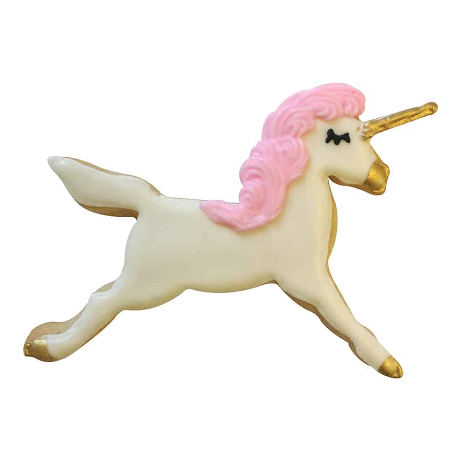 Unicorn-shaped cookie decorated with white icing, a pink mane, gold accents, and a golden horn.