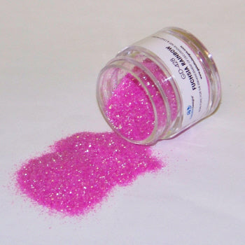 Fuchsia pink Galaxy Glitter Dust labeled “Fuchsia Rainbow” spilled from a jar, sparkling with bright, multidimensional flecks.