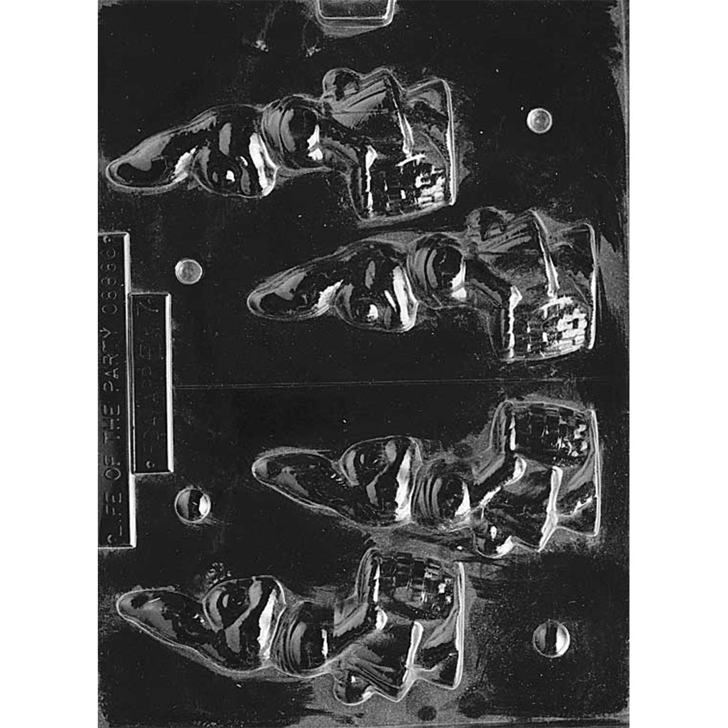 Clear plastic 3D chocolate mold with girl bunny cavities showing a rabbit in a dress holding a woven basket, with matching front and back halves on one sheet against a dark background.