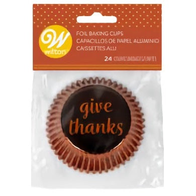 A package of wilton cupcake liners that say give thanks