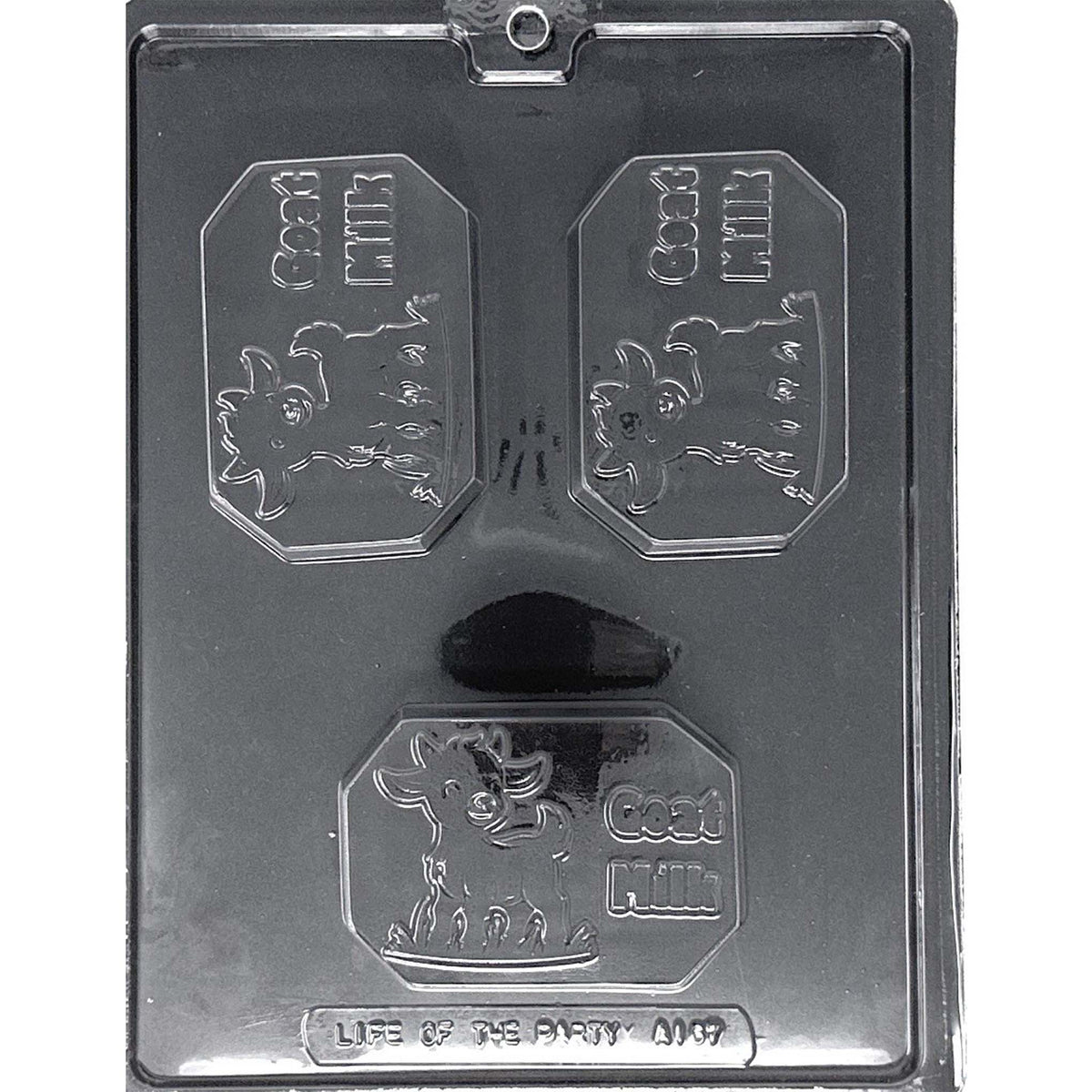Clear Goat Milk Chocolate Bar Mold photographed against a black background with three rectangular cavities featuring goat designs and raised “GOAT MILK” lettering.