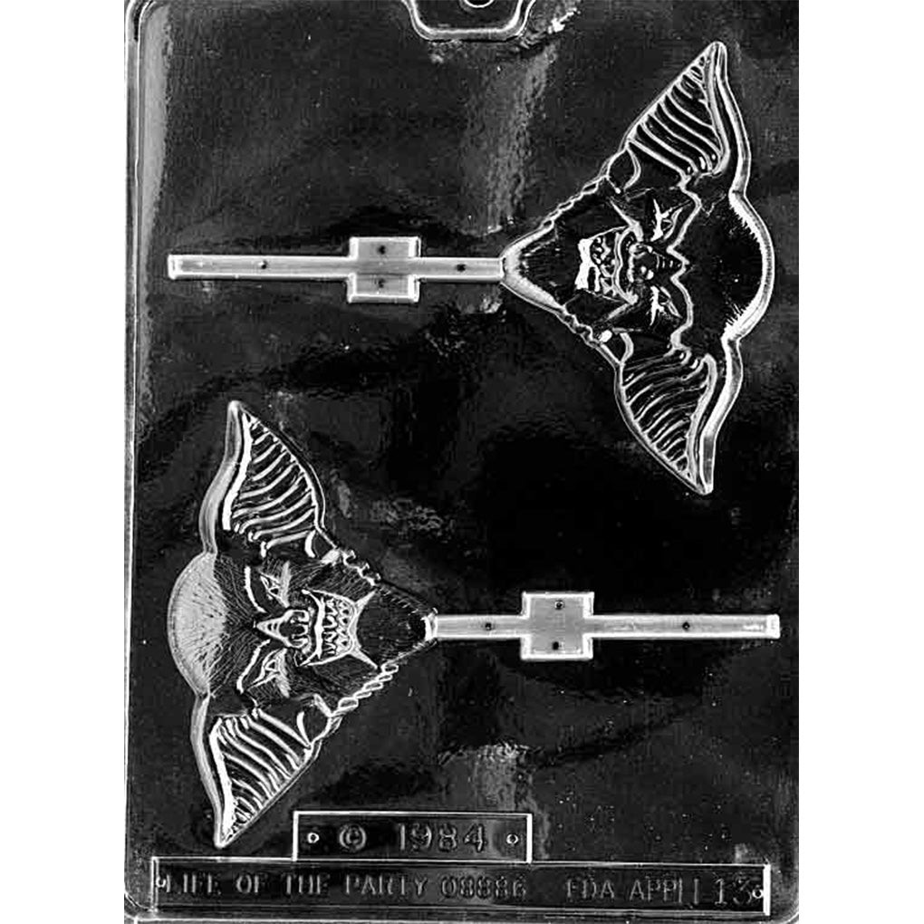 Ugly Goblin chocolate lollipop mold with two wide goblin-head cavities featuring pointed ears, long noses, toothy grins, and stick channels
