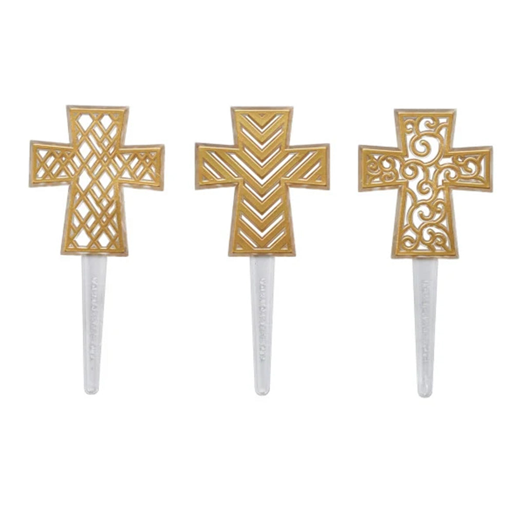 Three Gold Cross DecoPics cupcake picks with lattice, chevron, and scrolling openwork designs shown on clear stems.