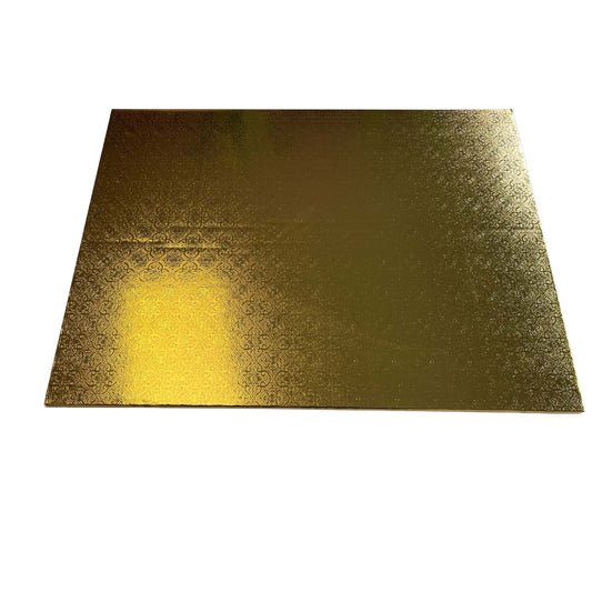 Embossed gold foil wrapped half sheet cake board with a subtle decorative pattern, photographed flat on a white background.