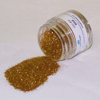 Jar labeled “Gold” spilling a heap of golden Galaxy Glitter Dust, radiating a rich, metallic luster on a clean white background.