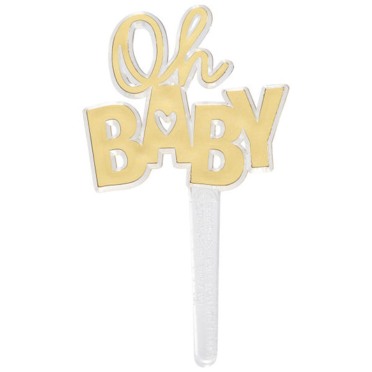 Gold "Oh Baby" cupcake pick with heart cutout detail on a clear plastic stick.
