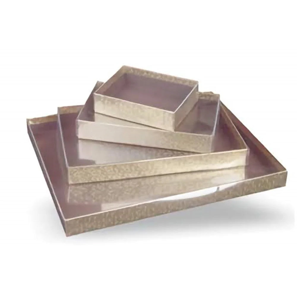 Stacked burnished gold candy boxes with clear lids in assorted sizes, showing the warm metallic bases and transparent tops against a white background.