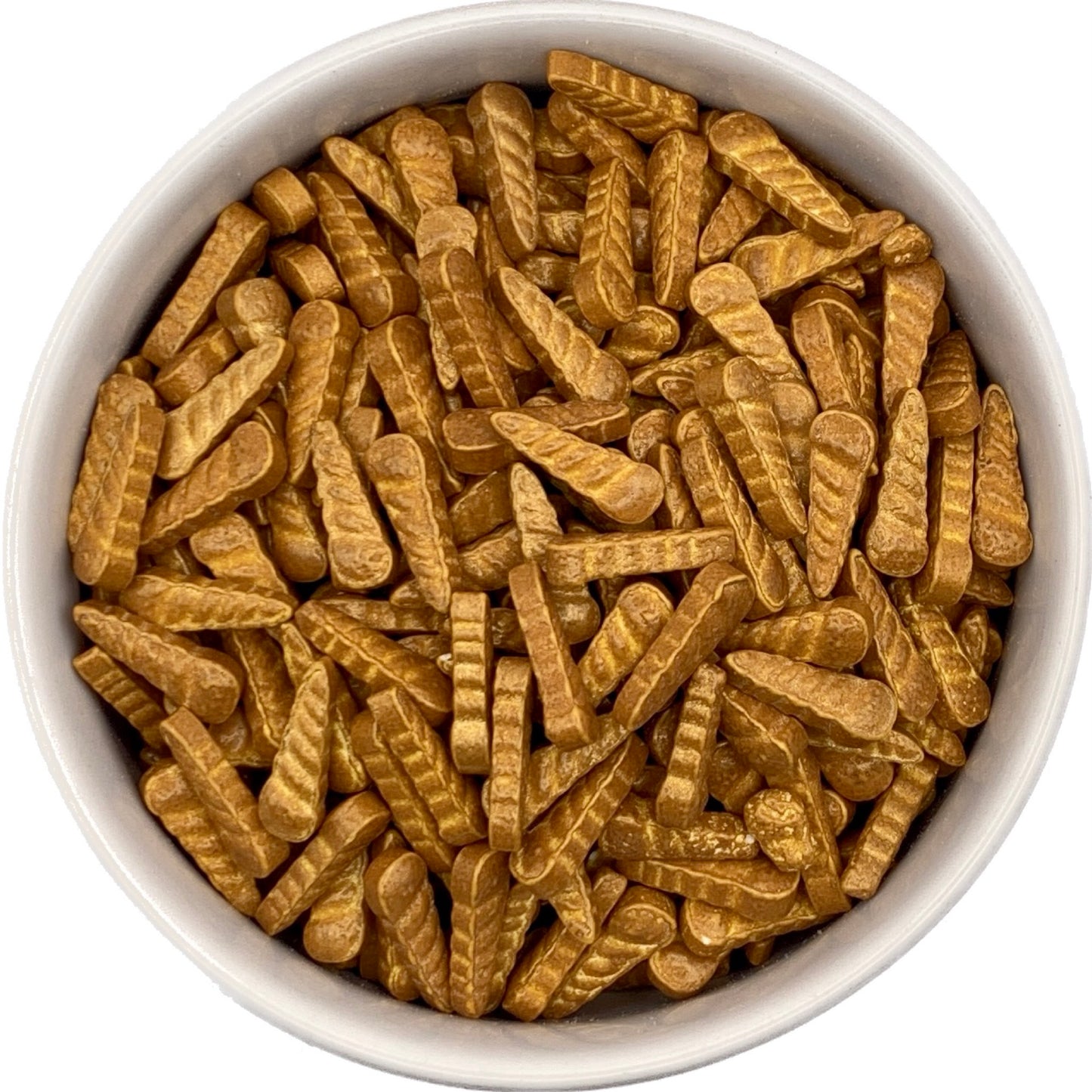 Glossy gold unicorn horn sprinkles in a white bowl, featuring detailed twisted shapes ideal for decorating cakes, cookies, and fantasy-themed desserts