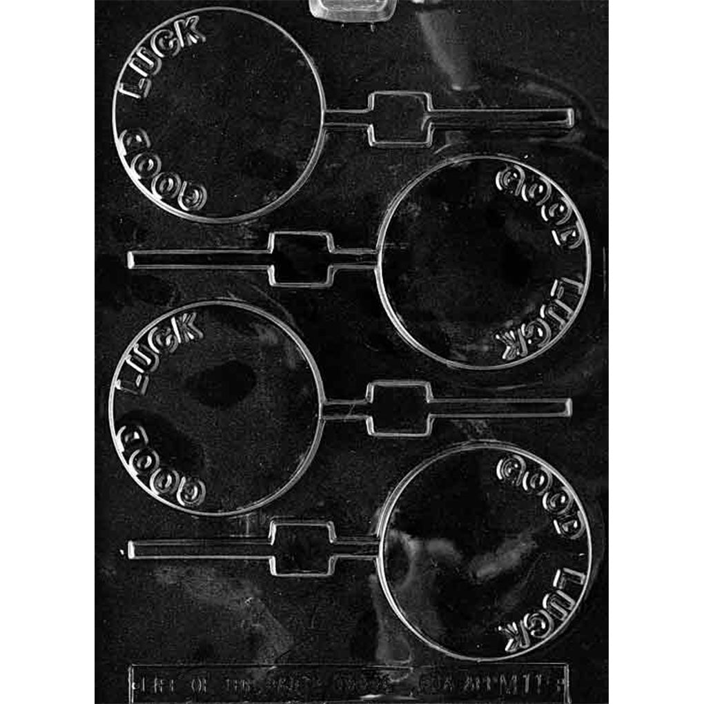 Clear plastic “Good Luck” chocolate lollipop mold with four round lollipop cavities, each embossed with the words “GOOD LUCK” around the edge and connected to stick channels.