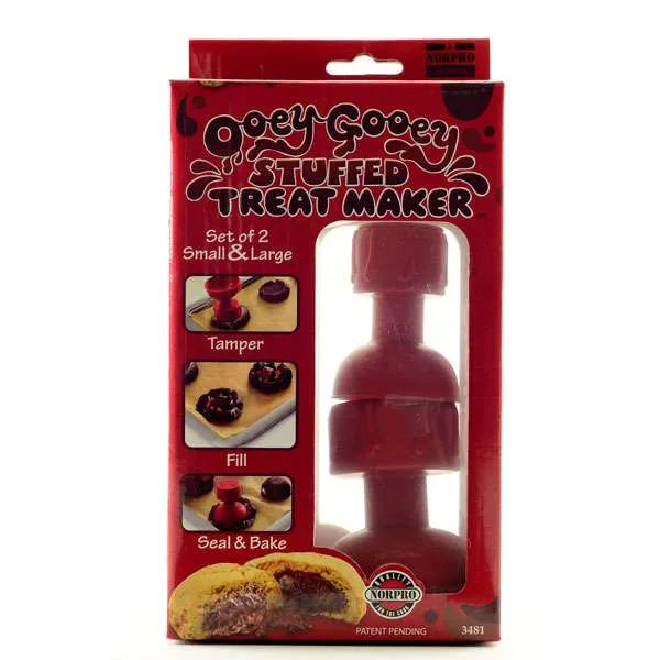 Red packaging for Ooey Gooey Stuffed Treat Maker, includes tamper, fill, seal, and bake tool.