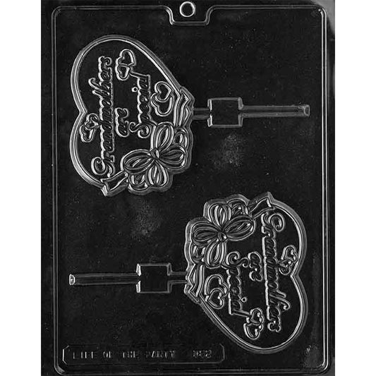 Clear plastic chocolate lollipop mold with two heart-shaped cavities featuring the message “Grandmothers Are Special” and a flower design.