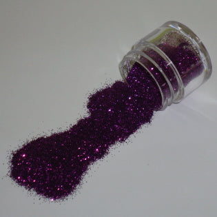 Deep purple Galaxy Glitter Dust flowing from a jar, glowing with bold, royal shimmer and bright violet flecks.