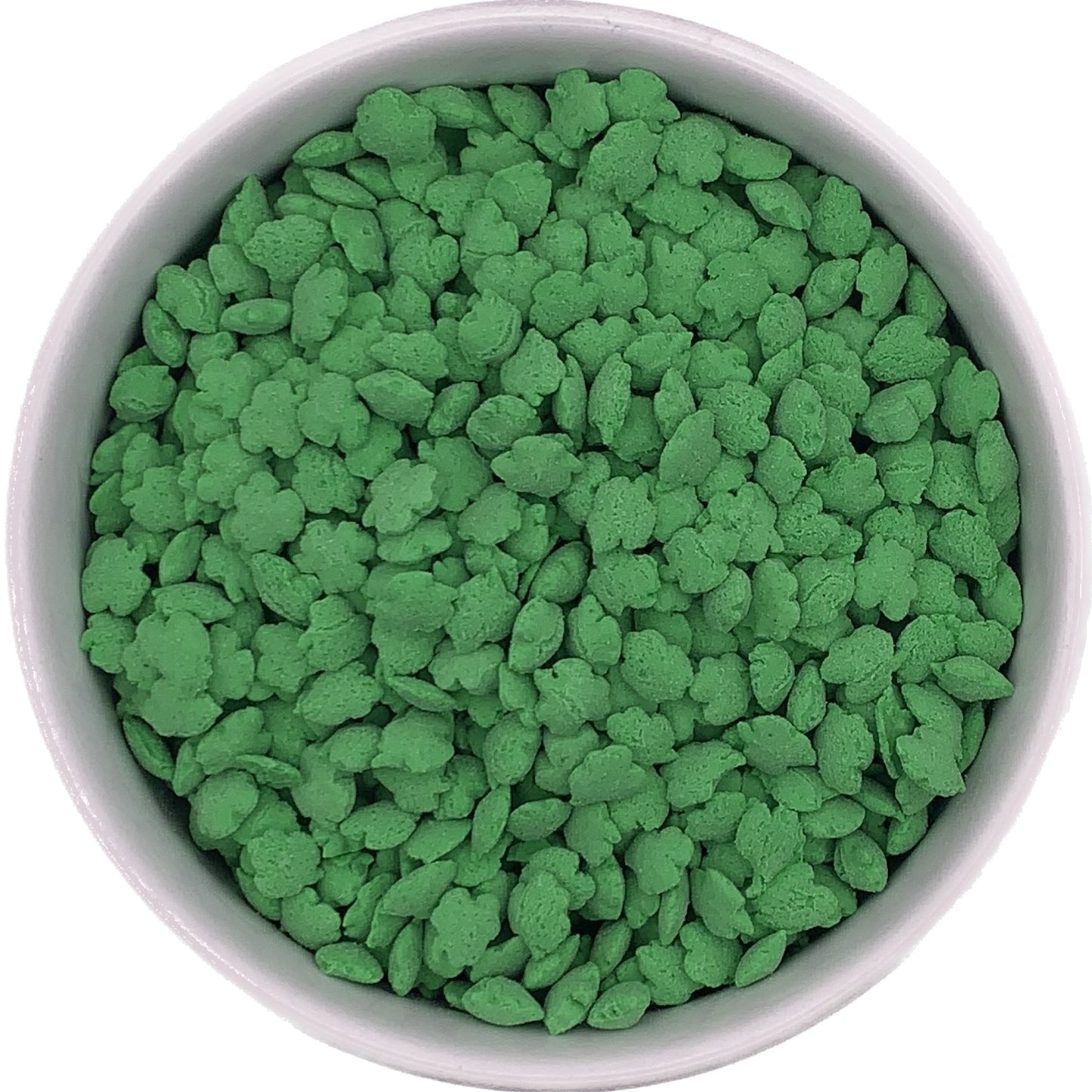 Bowl filled with green shamrock-shaped sprinkles, ideal for decorating St. Patrick’s Day cupcakes, cookies, and festive desserts