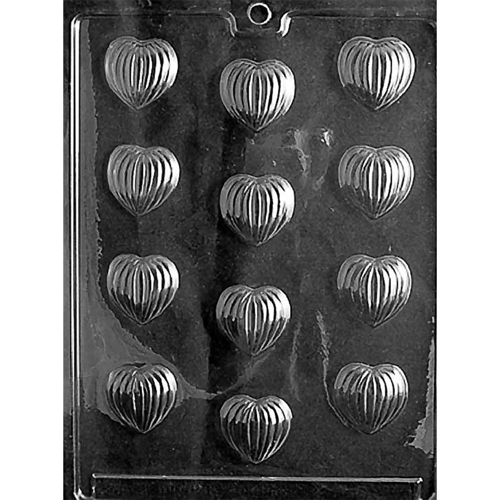 Grooved hearts chocolate mold with 12 small heart cavities featuring ribbed vertical lines and rounded heart shapes