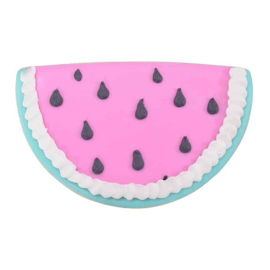 A decorated watermelon slice cookie with pink icing, black seeds, and a white and teal rind.