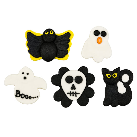 Assorted 1-inch Halloween royal icing edible decorations featuring white ghosts, a skull face, and black spooky creatures with yellow and orange details.