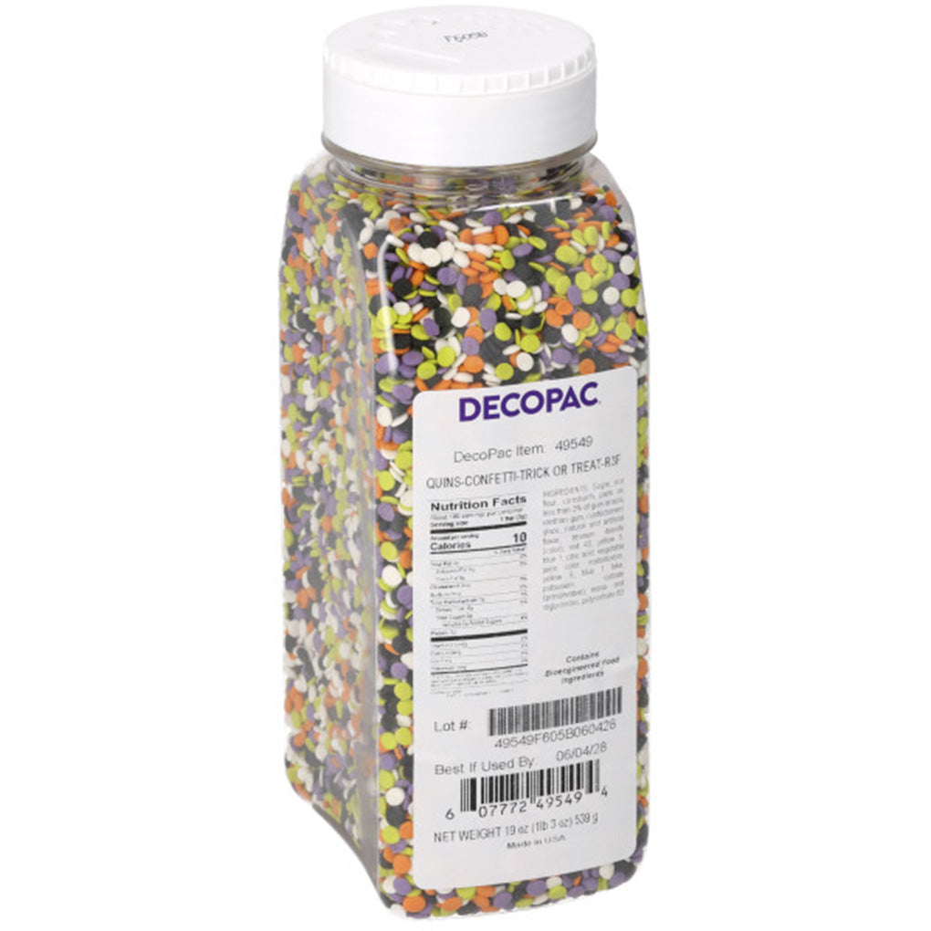 Clear DecoPac container filled with orange, black, white, lime green, and purple Halloween sequin sprinkles with a white screw-top lid and product label.