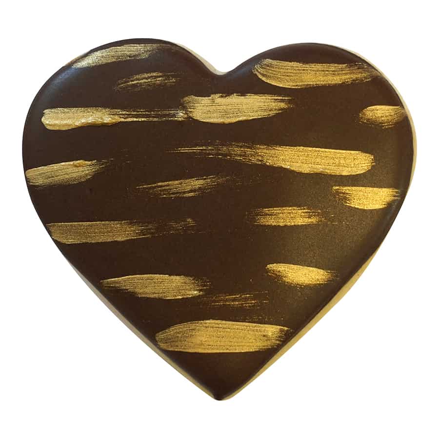 Chocolate-themed heart cookie with gold brushstroke design