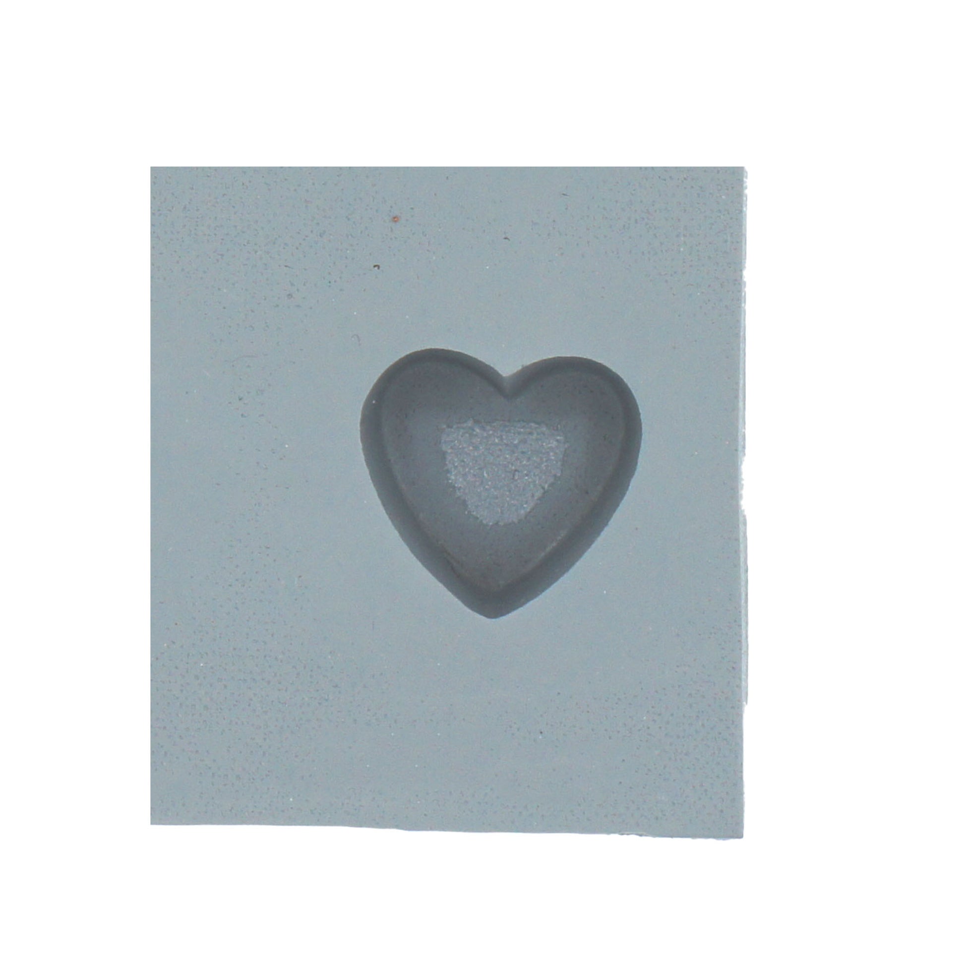 Close-up of a single mini heart-shaped rubber mint mold cavity, ideal for bite-sized candies, chocolates, or cream cheese mints.