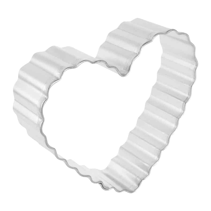 Angled view of the Fluted Heart Cookie Cutter highlighting its depth and ridged design.