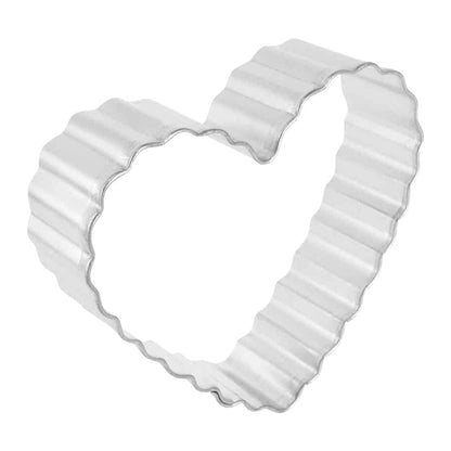 Angled view of the Fluted Heart Cookie Cutter highlighting its depth and ridged design.