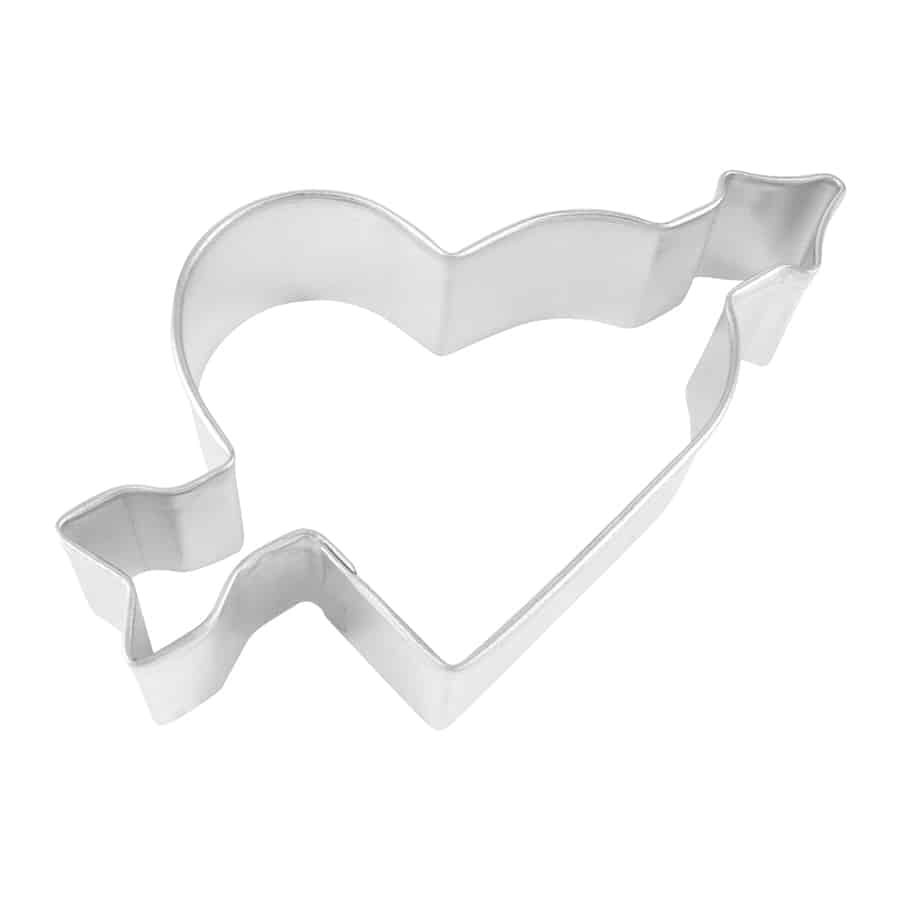 Metal heart with arrow-shaped cookie cutter, designed for Valentine's Day and romantic baking.