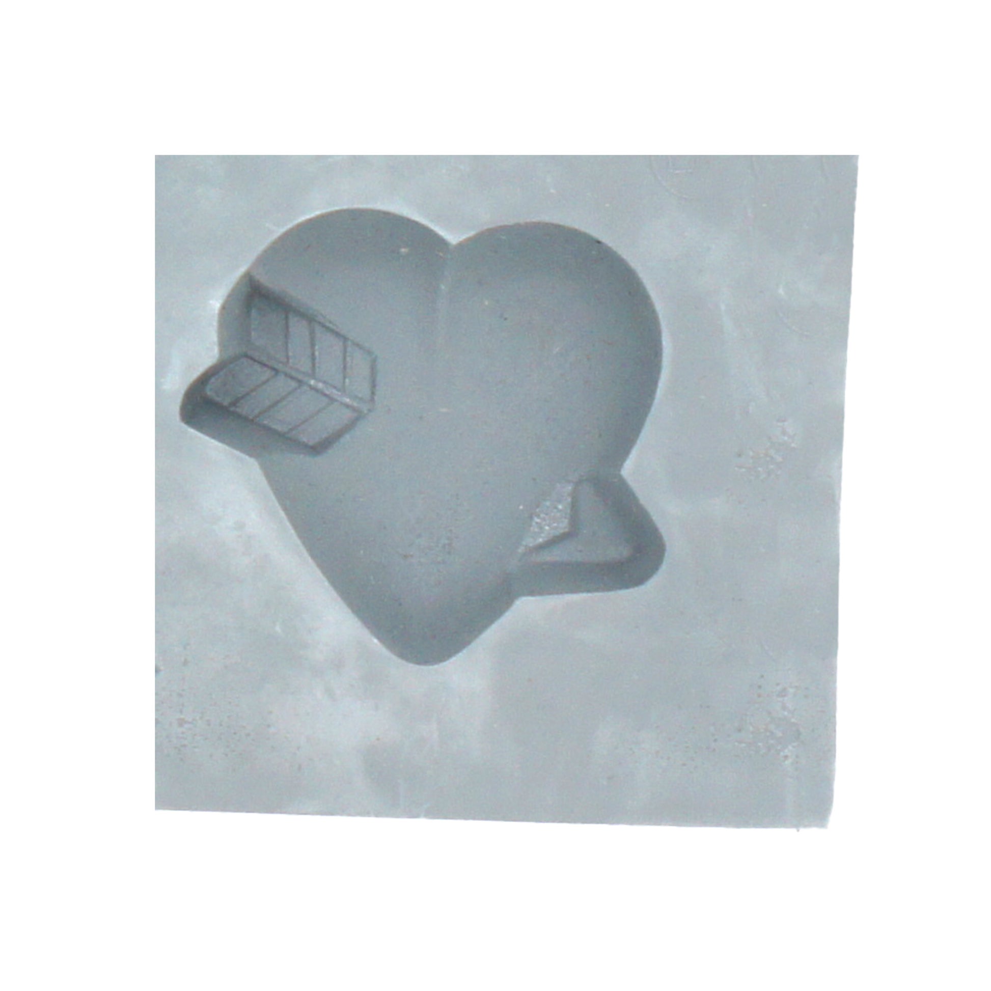 Close-up of a single heart with arrow rubber mint mold cavity, ideal for themed candies, mints, or chocolates.