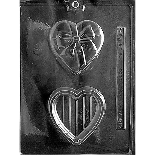 Chocolate mold with two heart-shaped cavities for an edible box, including a base with vertical lines and a separate lid decorated with ribbon and a bow.
