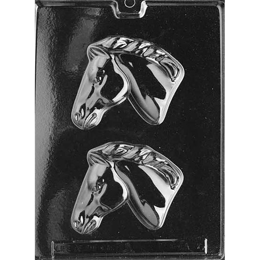 Clear plastic horse head chocolate mold photographed on a black background with two large equine profile cavities, showing raised mane detail and facial features.