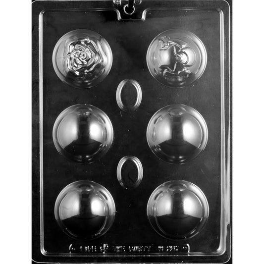 Clear plastic hot cocoa bomb mold with four smooth half-sphere cavities, one large rose design, and one star-and-moon design with shooting stars