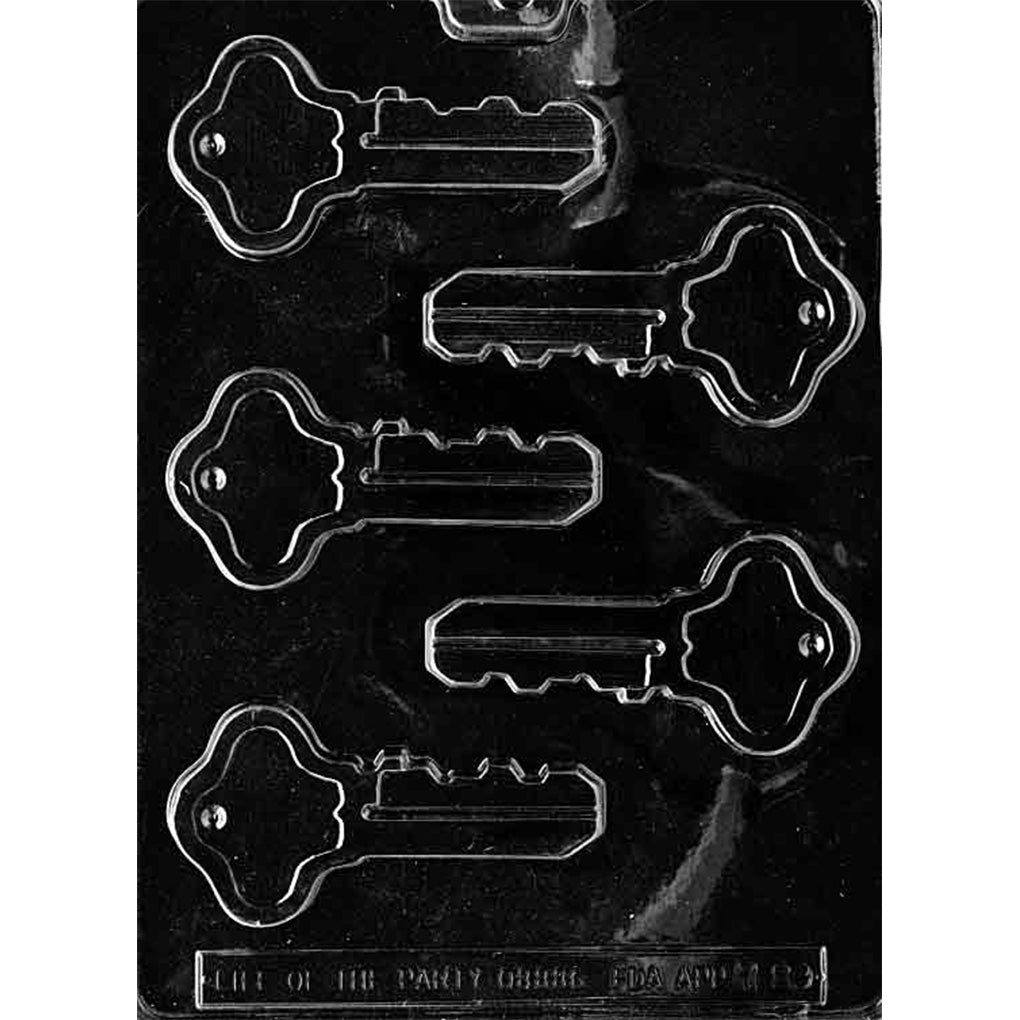 Clear plastic chocolate mold with six house key-shaped cavities featuring rounded key heads and notched teeth for making chocolate key treats.