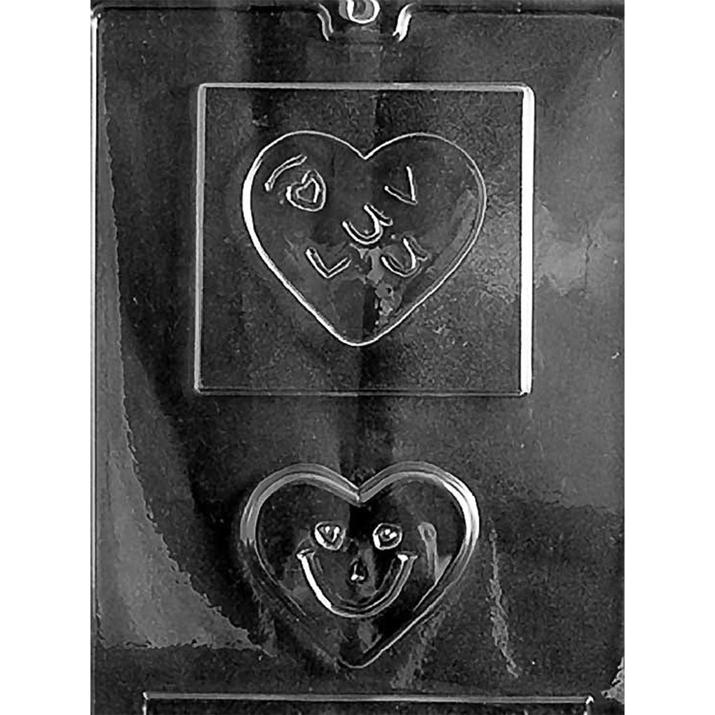 Two-cavity hidden-message chocolate mold with a square “I Luv U” base and removable smiling heart, measuring approximately 4 1/4 x 4 x 9/16 inches