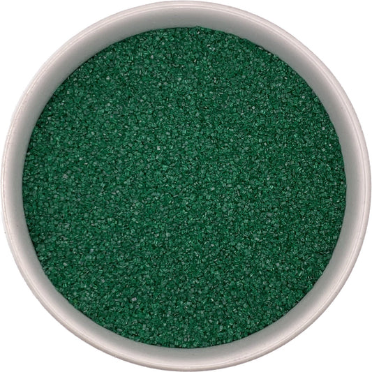 Green sanding sugar close-up, showing medium green crystals with vibrant sparkle and smooth texture.