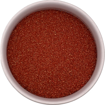 Red colored fine sanding sugar