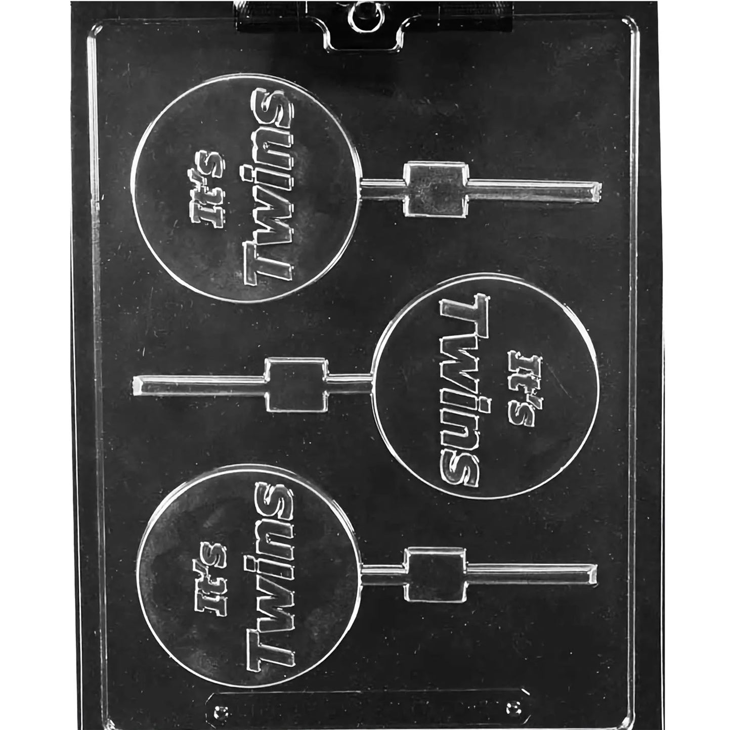 Clear plastic chocolate lollipop mold with round cavities embossed with the words “It’s Twins,” each circle connected to a stick channel.