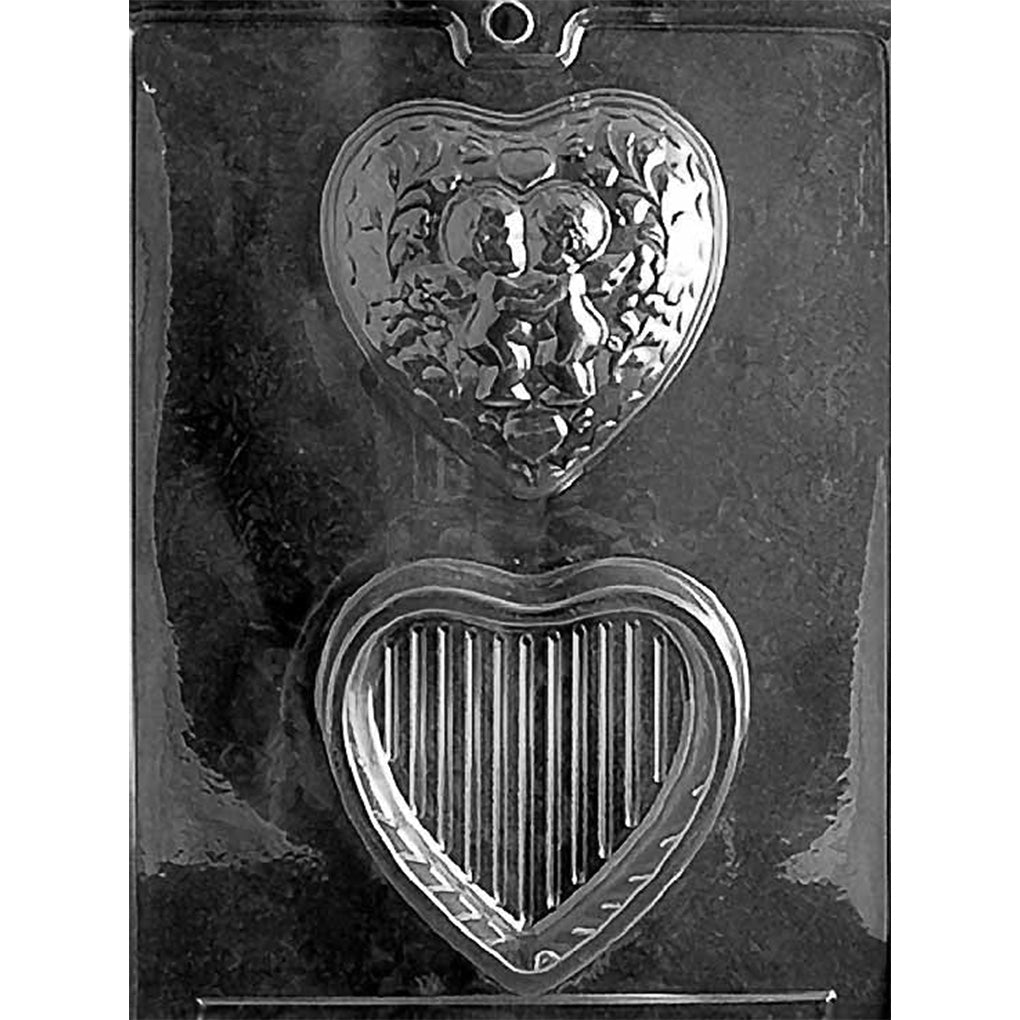 Clear plastic Kissing Cupid heart pour box chocolate mold with two cavities for a detailed cupid lid and ribbed base, assembling to 3 3/4 x 3 5/8 x 1 3/4 inches.
