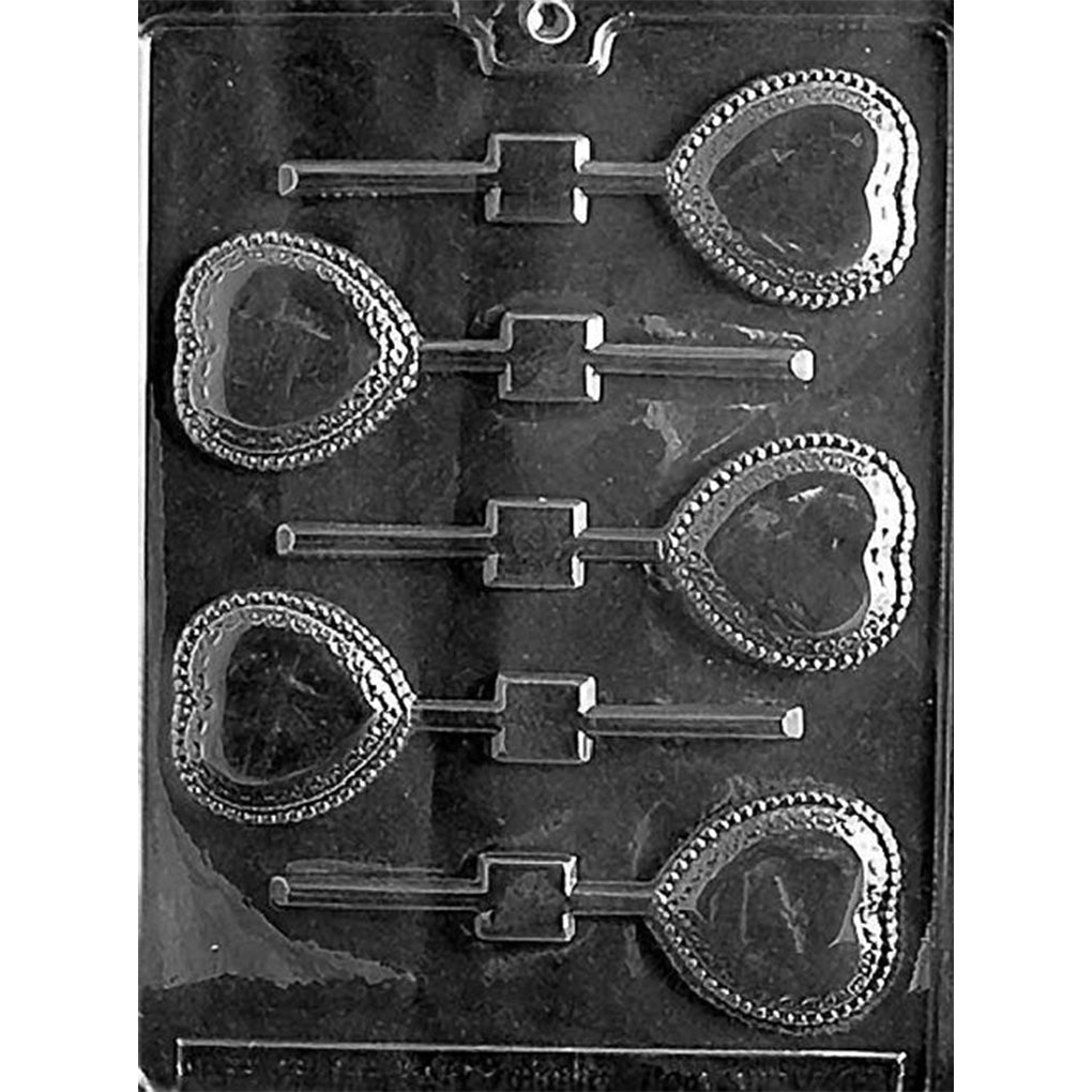 Clear chocolate lollipop mold with five heart-shaped cavities, each featuring a lace-style border around a smooth heart center and a straight stick channel.