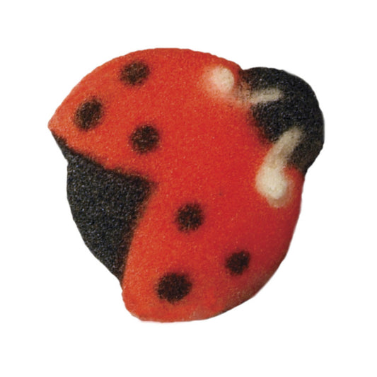 Single edible sugar ladybug decoration with red wings, black dots, and white accent.