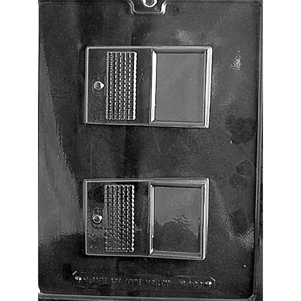 Clear plastic chocolate mold with two laptop-shaped cavities, each showing an open screen rectangle and a textured keyboard panel.